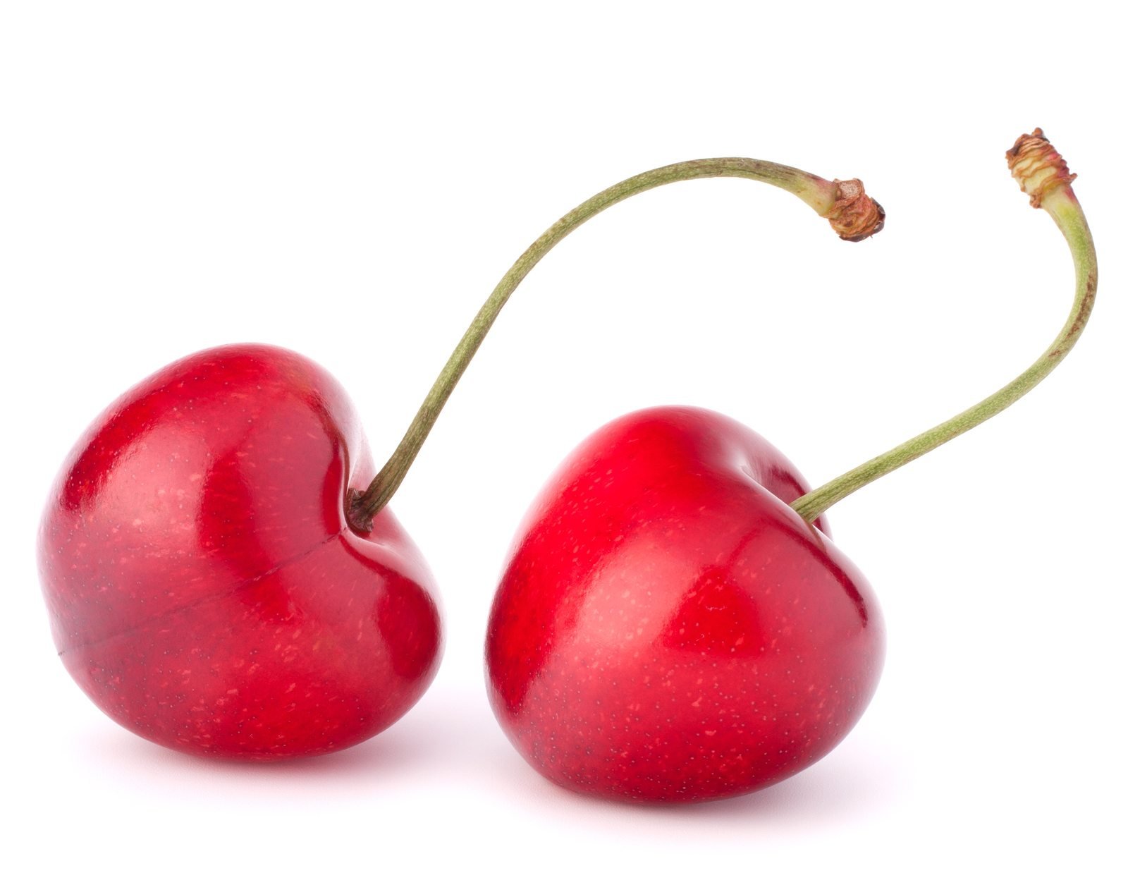 Two heart shaped cherry berries isolated on white background cut