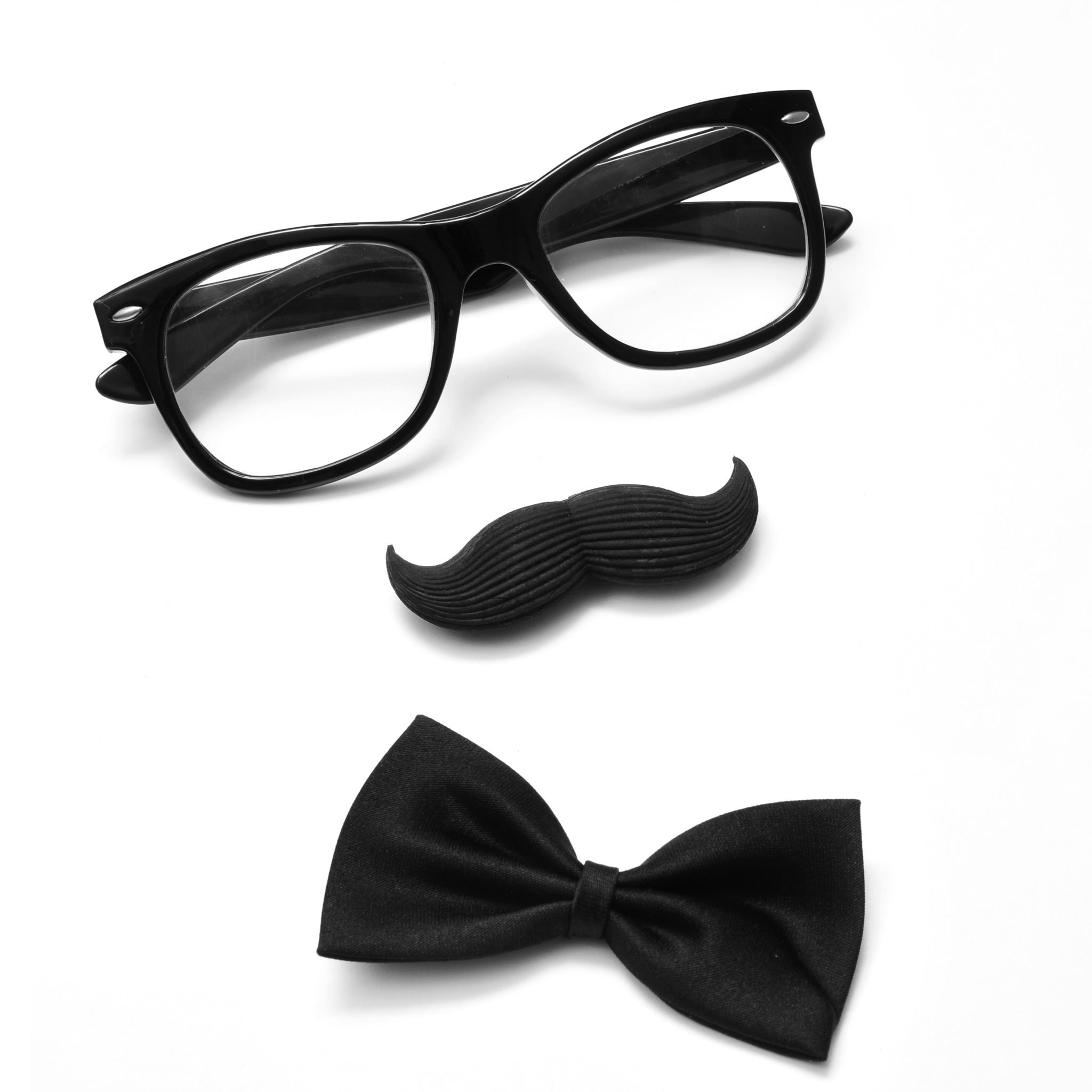 a pair of glasses, a mustache and a bowtie on a white background