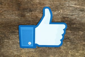 KIEV UKRAINE - APRIL 15 2015: Facebook thumbs up sign printed on