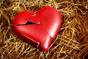 Photo with a broken heart protected with straws